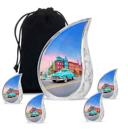 Navy Blue Car Cremation Urn side profile showing urn shape - flowing teardrop car silhouette on curved aluminum - memorial set with one large and four small urns