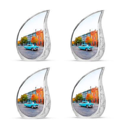 Moonlight Silver Car Cremation Urn close-up of engraving and surface detail - smooth teardrop contour featuring car art - 10 inch aluminum urn for cremated remains
