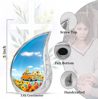 Dusty Blue Car Cremation Urn angled view of lid and engraved motif - rounded teardrop car design with delicate detail - mini keepsake memorial for portion of cremation ashes