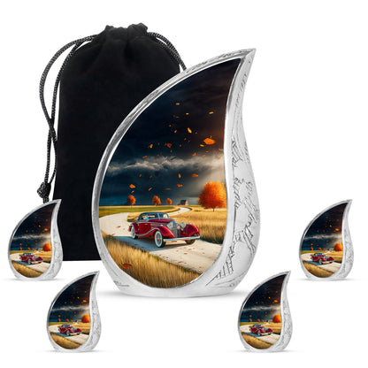 Azure Car Cremation Urn side profile showing urn shape - rounded teardrop car design with delicate detail - memorial set with one large and four small urns