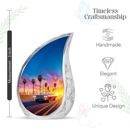 Sapphire Blue Car Cremation Urn angled view of lid and engraved motif - smooth teardrop contour featuring car art - mini keepsake memorial for portion of cremation ashes