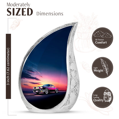 Powder Blue Car Cremation Urn angled view of lid and engraved motif - flowing teardrop car silhouette on curved aluminum - mini keepsake memorial for portion of cremation ashes