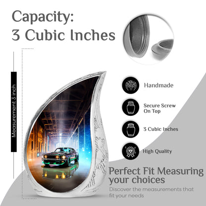 Onyx Black Car Cremation Urn angled view of lid and engraved motif - smooth teardrop contour featuring car art - mini keepsake memorial for portion of cremation ashes