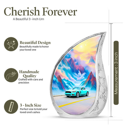 Soft Teal Car Cremation Urn angled view of lid and engraved motif - flowing teardrop car silhouette on curved aluminum - mini keepsake memorial for portion of cremation ashes