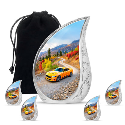 Sapphire Blue Car Cremation Urn side profile showing urn shape - graceful tear-shaped urn with car motif - memorial set with one large and four small urns
