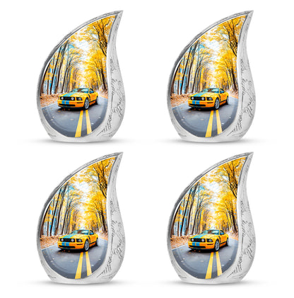 Serene Blue Car Cremation Urn close-up of engraving and surface detail - smooth teardrop contour featuring car art - 10 inch aluminum urn for cremated remains