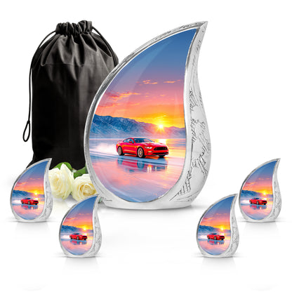 Petal Pink Car Cremation Urn side profile showing urn shape - smooth teardrop contour featuring car art - memorial set with one large and four small urns
