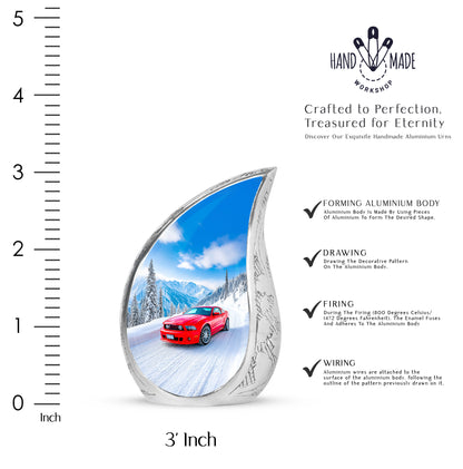 Indigo Car Cremation Urn angled view of lid and engraved motif - flowing teardrop car silhouette on curved aluminum - mini keepsake memorial for portion of cremation ashes