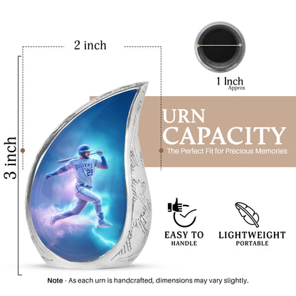 Calming Blue Baseball Cremation Urn angled view of lid and engraved motif - graceful tear-shaped urn with baseball motif - mini keepsake memorial for portion of cremation ashes