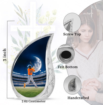 Misty Blue Baseball Cremation Urn angled view of lid and engraved motif - rounded teardrop baseball design with delicate detail - mini keepsake memorial for portion of cremation ashes