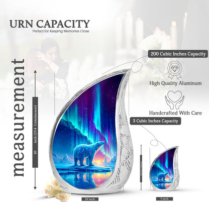 Pastel Blue Bear Cremation Urn angled view of lid and engraved motif - flowing teardrop bear silhouette on curved aluminum - mini keepsake memorial for portion of cremation ashes