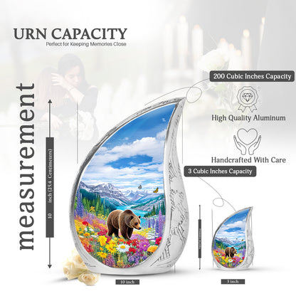 Sapphire Blue Bear Cremation Urn angled view of lid and engraved motif - smooth teardrop contour featuring bear art - mini keepsake memorial for portion of cremation ashes