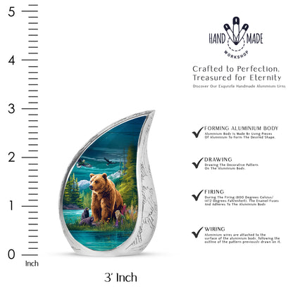 Ocean Teal Bear Cremation Urn angled view of lid and engraved motif - flowing teardrop bear silhouette on curved aluminum - mini keepsake memorial for portion of cremation ashes