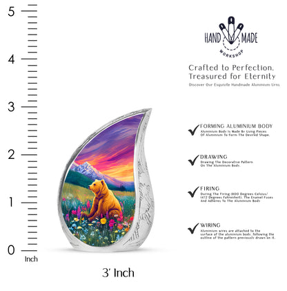 Blush Pink Bear Cremation Urn angled view of lid and engraved motif - flowing teardrop bear silhouette on curved aluminum - mini keepsake memorial for portion of cremation ashes