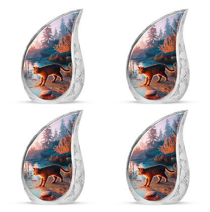 Dusty Blue Cat Cremation Urn close-up of engraving and surface detail - flowing teardrop cat silhouette on curved aluminum - 10 inch aluminum urn for cremated remains
