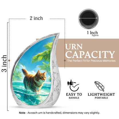 Indigo Cat Cremation Urn angled view of lid and engraved motif - flowing teardrop cat silhouette on curved aluminum - mini keepsake memorial for portion of cremation ashes