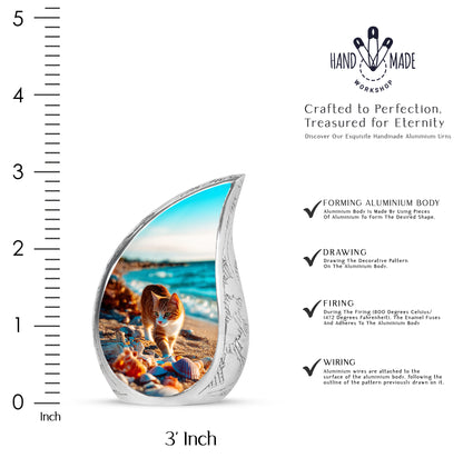 Jewel Teal Cat Cremation Urn angled view of lid and engraved motif - flowing teardrop cat silhouette on curved aluminum - mini keepsake memorial for portion of cremation ashes