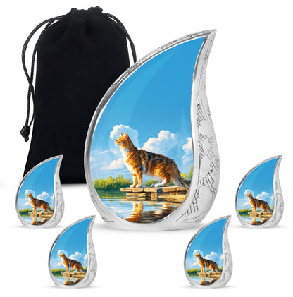Sapphire Blue Cat Cremation Urn side profile showing urn shape - smooth teardrop contour featuring cat art - memorial set with one large and four small urns
