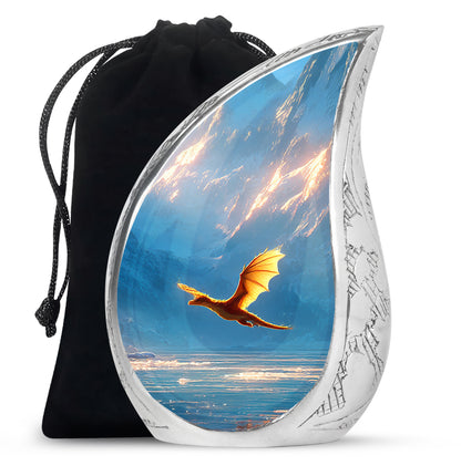 Powder Blue Dragon Cremation Urn front view showing detailed design - flowing teardrop dragon silhouette on curved aluminum - full-size 10 inch 200 cubic inch adult cremation urn