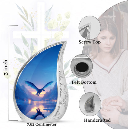 Dusty Blue Dragon Cremation Urn angled view of lid and engraved motif - rounded teardrop dragon design with delicate detail - mini keepsake memorial for portion of cremation ashes