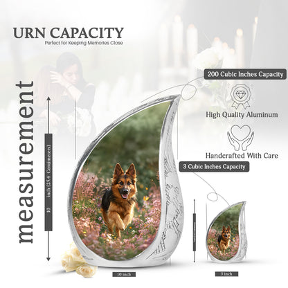 Marigold Yellow Dog Cremation Urn angled view of lid and engraved motif - smooth teardrop contour featuring dog art - mini keepsake memorial for portion of cremation ashes