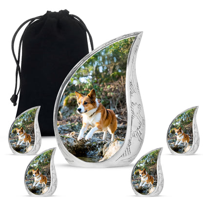Verdant Green Dog Cremation Urn side profile showing urn shape - flowing teardrop dog silhouette on curved aluminum - memorial set with one large and four small urns