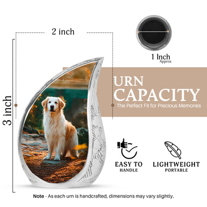 Charcoal Black Dog Cremation Urn angled view of lid and engraved motif - smooth teardrop contour featuring dog art - mini keepsake memorial for portion of cremation ashes
