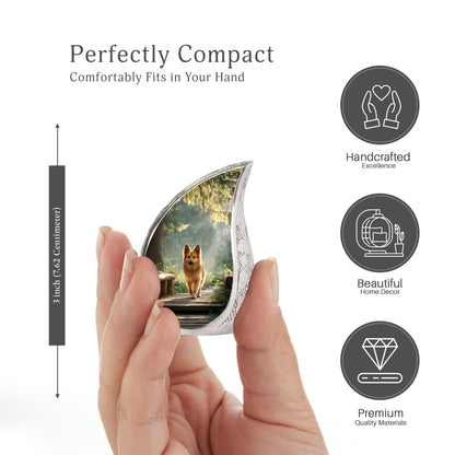Sage Green Dog Cremation Urn angled view of lid and engraved motif - flowing teardrop dog silhouette on curved aluminum - mini keepsake memorial for portion of cremation ashes