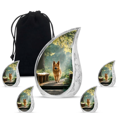 Sage Green Dog Cremation Urn side profile showing urn shape - rounded teardrop dog design with delicate detail - memorial set with one large and four small urns