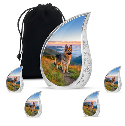 Indigo Dog Cremation Urn side profile showing urn shape - flowing teardrop dog silhouette on curved aluminum - memorial set with one large and four small urns