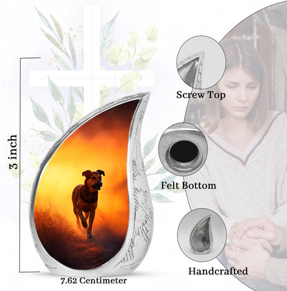 Burnished Gold Dog Cremation Urn angled view of lid and engraved motif - smooth teardrop contour featuring dog art - mini keepsake memorial for portion of cremation ashes
