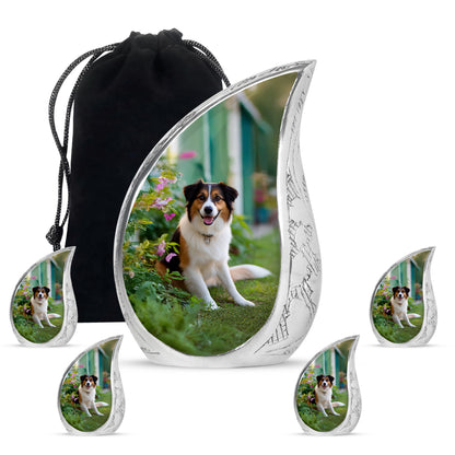 Moss Green Dog Cremation Urn side profile showing urn shape - rounded teardrop dog design with delicate detail - memorial set with one large and four small urns