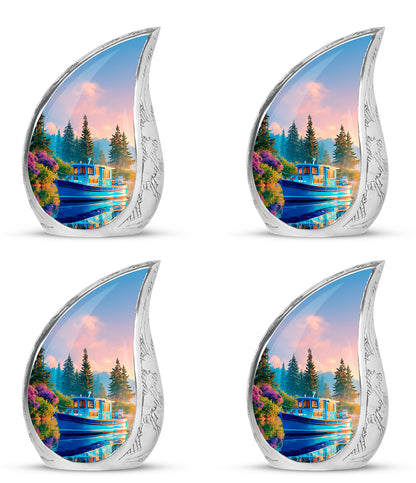 Cobalt Blue Boat Cremation Urn close-up of engraving and surface detail - graceful tear-shaped urn with boat motif - 10 inch aluminum urn for cremated remains