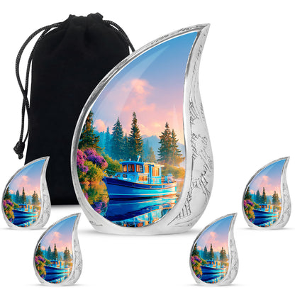 Bright Blue Boat Cremation Urn side profile showing urn shape - smooth teardrop contour featuring boat art - memorial set with one large and four small urns