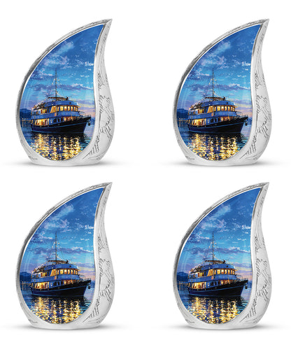 Twilight Blue Boat Cremation Urn close-up of engraving and surface detail - graceful tear-shaped urn with boat motif - 10 inch aluminum urn for cremated remains