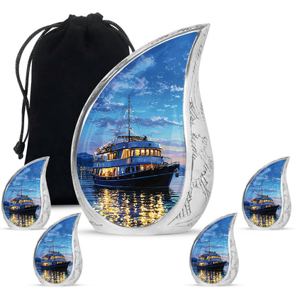 Navy Blue Boat Cremation Urn side profile showing urn shape - flowing teardrop boat silhouette on curved aluminum - memorial set with one large and four small urns