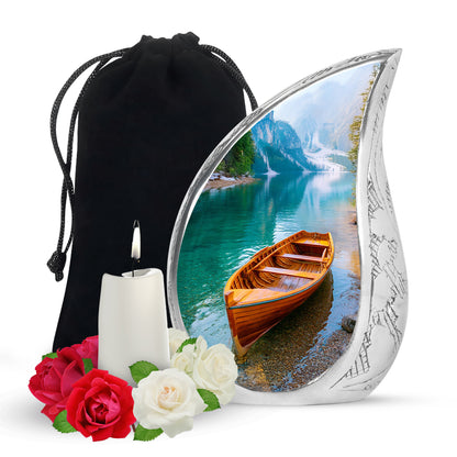 Deep Teal Boat Cremation Urn front view showing detailed design - smooth teardrop contour featuring boat art - full-size 10 inch 200 cubic inch adult cremation urn
