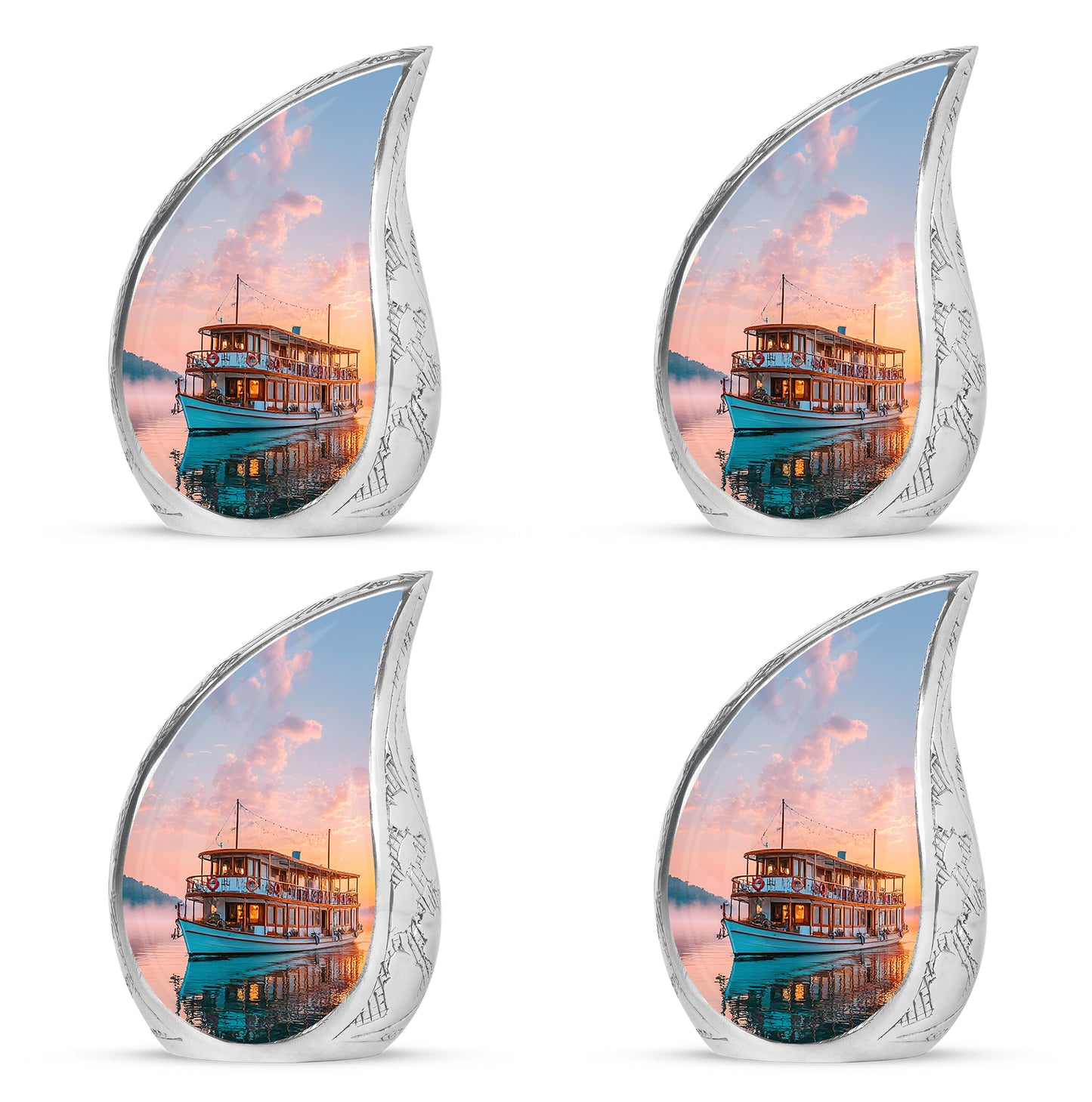Ruby Red Boat Cremation Urn close-up of engraving and surface detail - graceful tear-shaped urn with boat motif - 10 inch aluminum urn for cremated remains