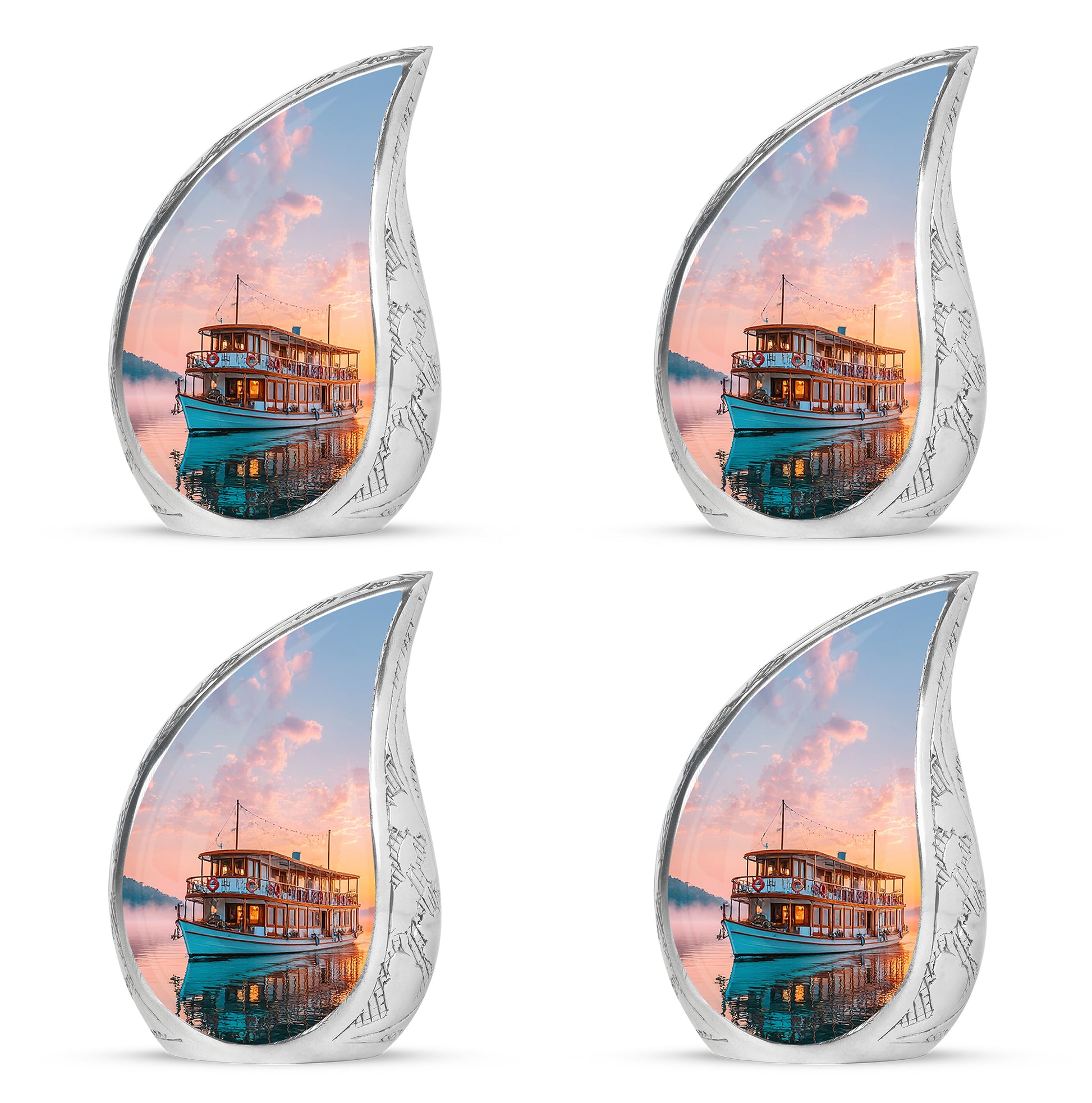 Ruby Red Boat Cremation Urn close-up of engraving and surface detail - graceful tear-shaped urn with boat motif - 10 inch aluminum urn for cremated remains