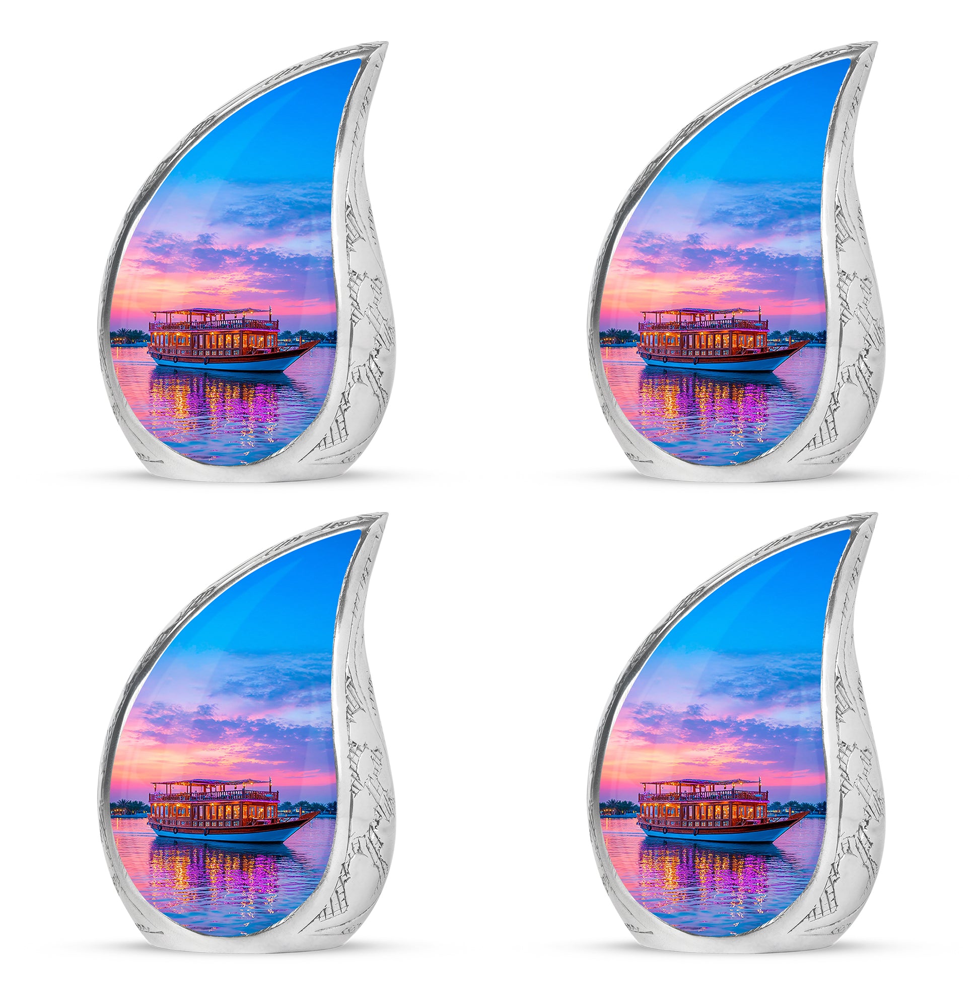 Cobalt Blue Boat Cremation Urn close-up of engraving and surface detail - smooth teardrop contour featuring boat art - 10 inch aluminum urn for cremated remains