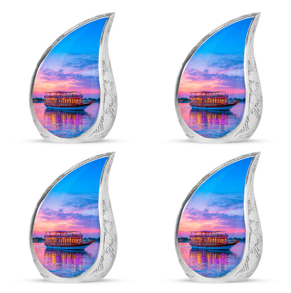 Cobalt Blue Boat Cremation Urn close-up of engraving and surface detail - smooth teardrop contour featuring boat art - 10 inch aluminum urn for cremated remains
