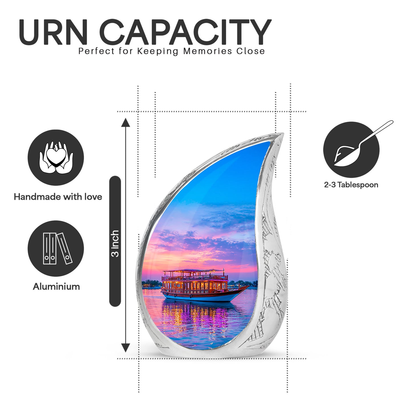 Indigo Boat Cremation Urn angled view of lid and engraved motif - rounded teardrop boat design with delicate detail - mini keepsake memorial for portion of cremation ashes