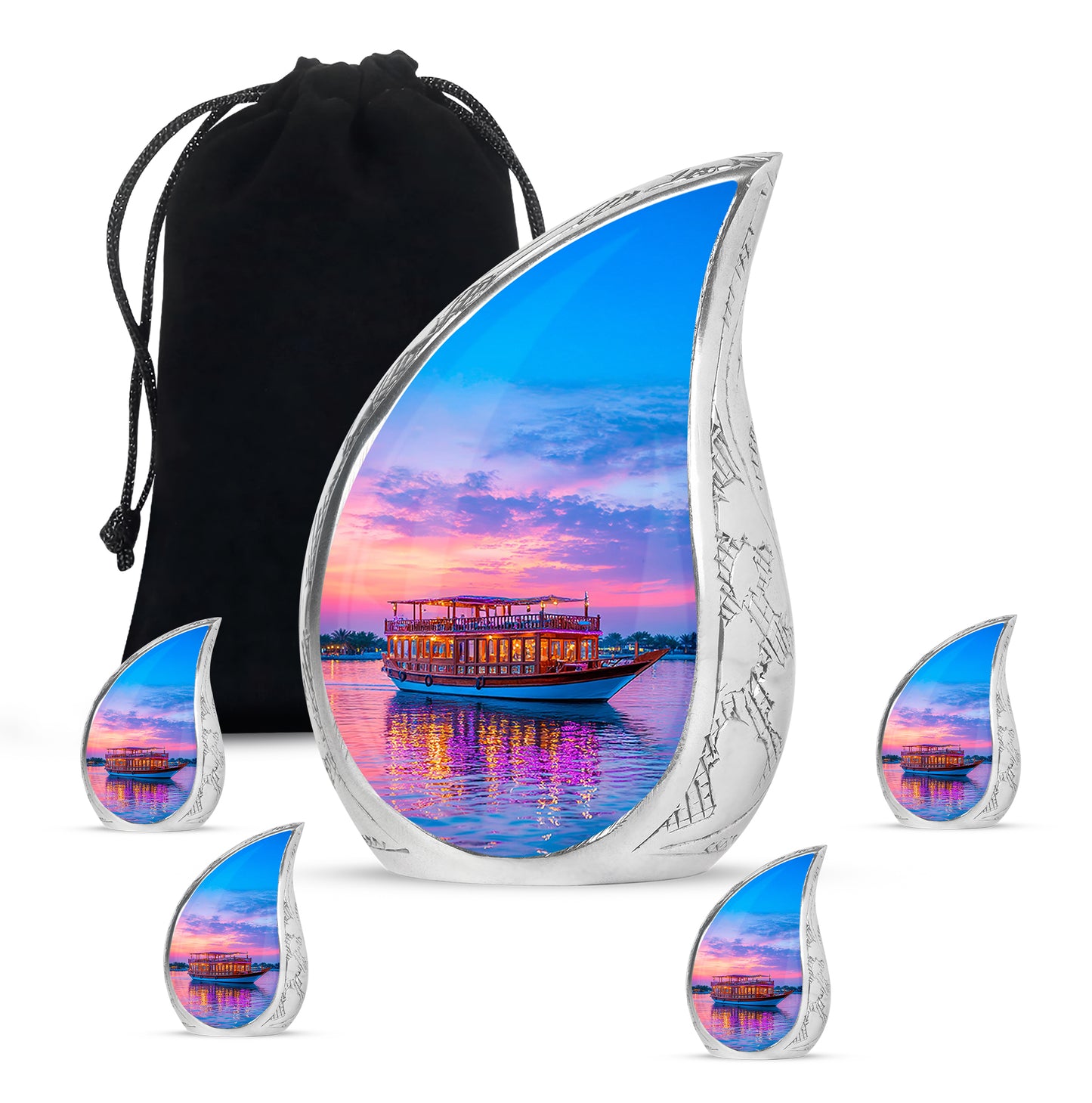 Indigo Boat Cremation Urn side profile showing urn shape - rounded teardrop boat design with delicate detail - memorial set with one large and four small urns