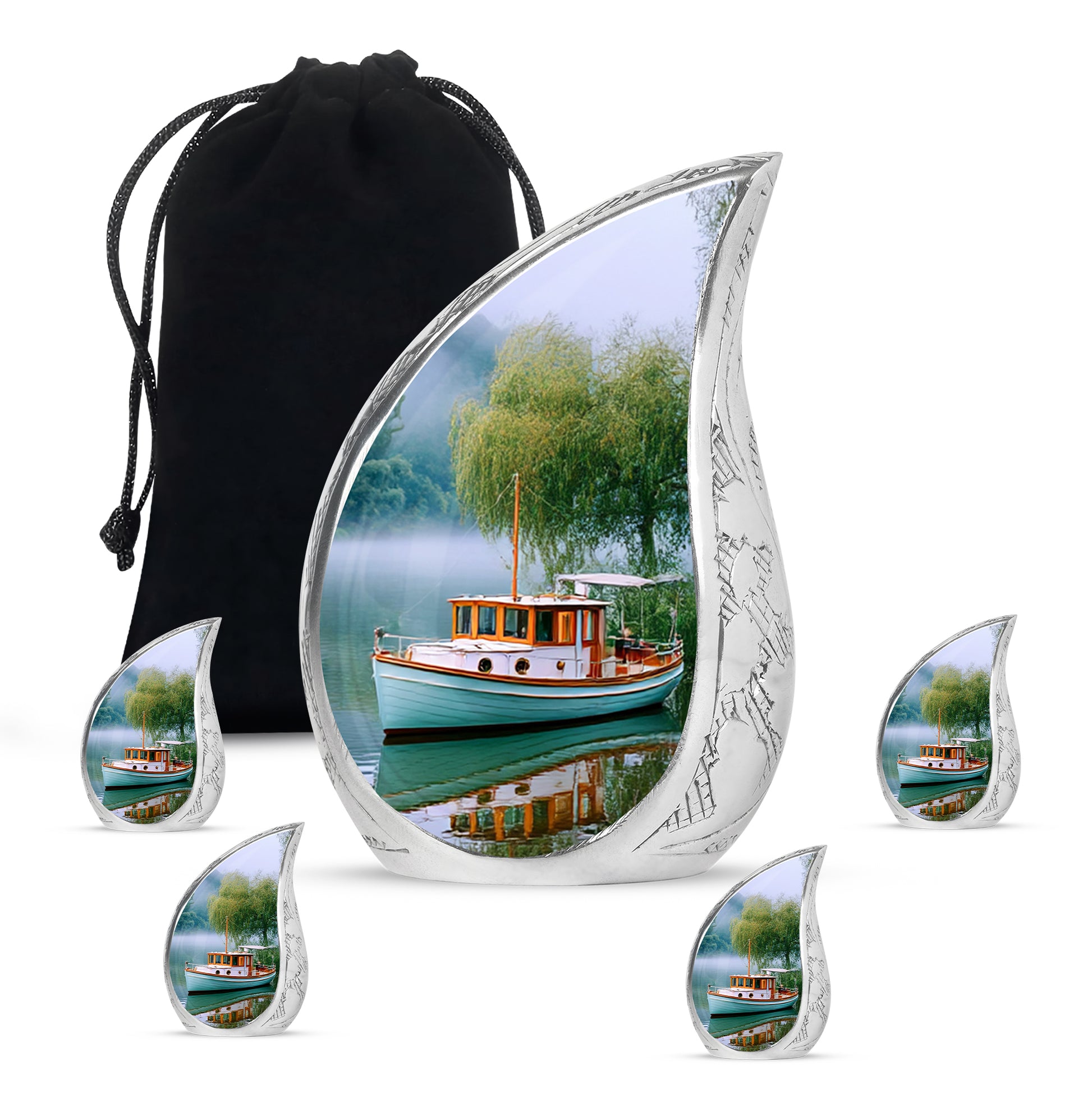 Soft Teal Boat Cremation Urn side profile showing urn shape - rounded teardrop boat design with delicate detail - memorial set with one large and four small urns