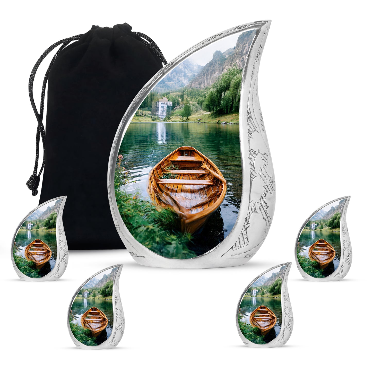 Moss Green Boat Cremation Urn side profile showing urn shape - rounded teardrop boat design with delicate detail - memorial set with one large and four small urns