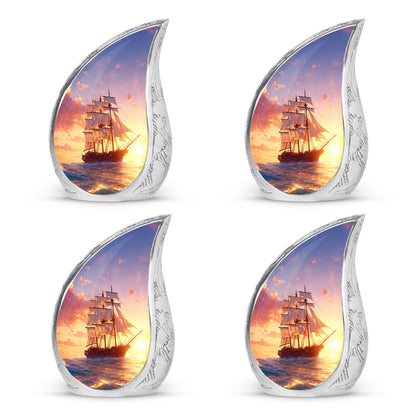 Slate Blue Boat Cremation Urn close-up of engraving and surface detail - rounded teardrop boat design with delicate detail - 10 inch aluminum urn for cremated remains