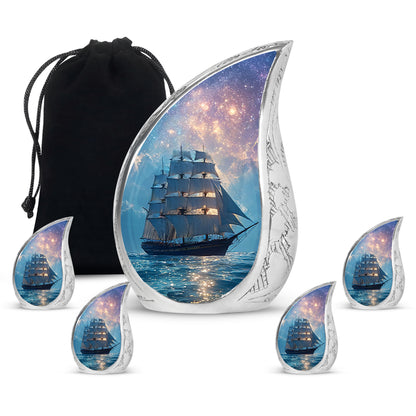 Powder Blue Boat Cremation Urn side profile showing urn shape - flowing teardrop boat silhouette on curved aluminum - memorial set with one large and four small urns