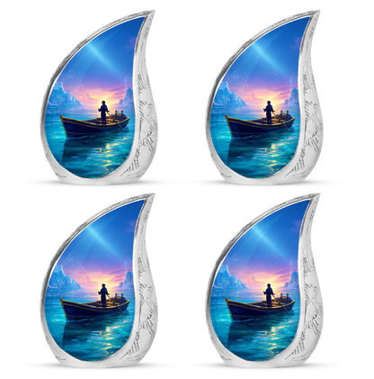 Slate Blue Boat Cremation Urn close-up of engraving and surface detail - rounded teardrop boat design with delicate detail - 10 inch aluminum urn for cremated remains