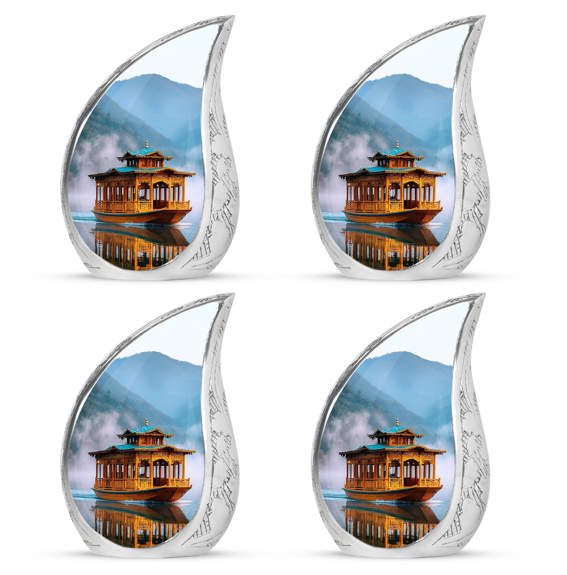Navy Blue Boat Cremation Urn close-up of engraving and surface detail - rounded teardrop boat design with delicate detail - 10 inch aluminum urn for cremated remains