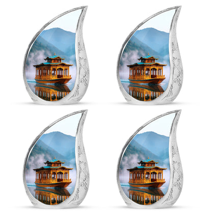 Navy Blue Boat Cremation Urn close-up of engraving and surface detail - rounded teardrop boat design with delicate detail - 10 inch aluminum urn for cremated remains